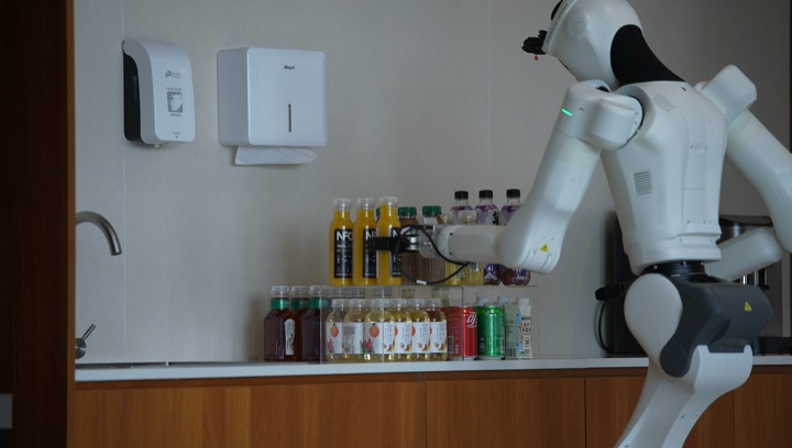 Three robots run the same harness with embodiment-specific profiles and tool implementations, frame 1 of 3.